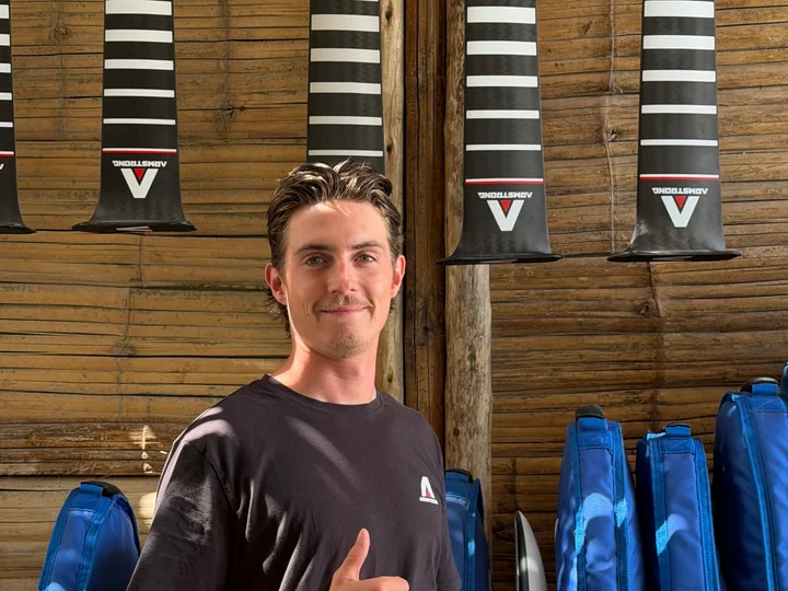 Dillan Dallesandro standing in front of Armstrong foil equipment.