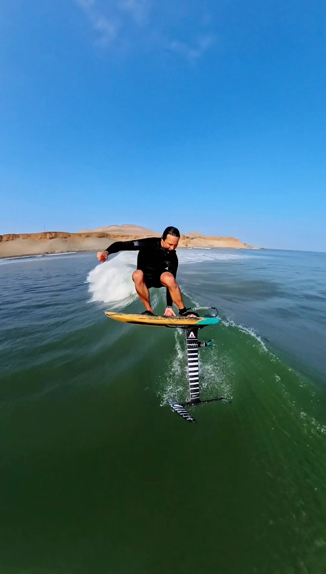 Paul Cooper carving on a foil board at Chicama.